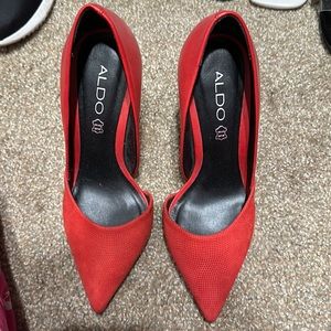 Genuine red leather pumps